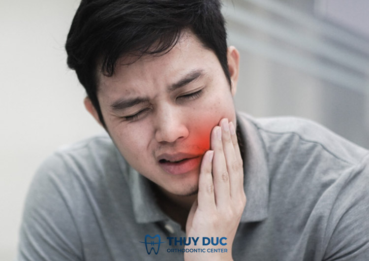 Cách giảm đau sau khi trồng răng giả 1